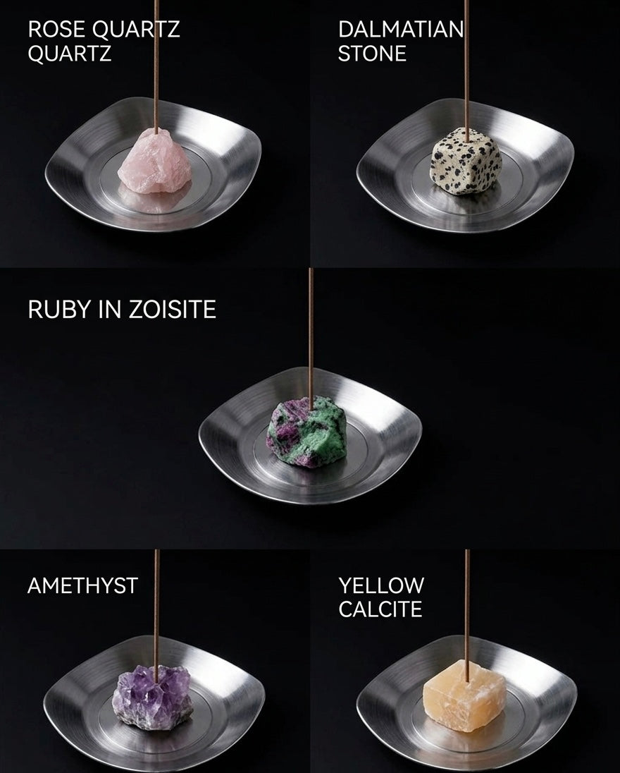 Collection of gemstones on stands with labels on a black background